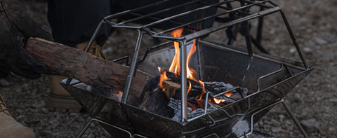 for slow and thorough cooking.
Allows you to add firewood and adjust fire. No more need to remove the grill to add more firewood.