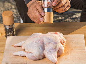 Rub the chicken with olive oil and your favorite seasoning mix.