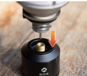 Carefully insert the stainless steel refill nozzle into the refill valve of your device.